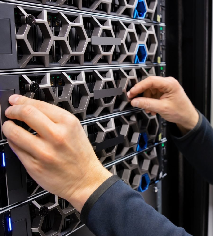 Hands Of Male IT Support Professional Adjusting Hardware