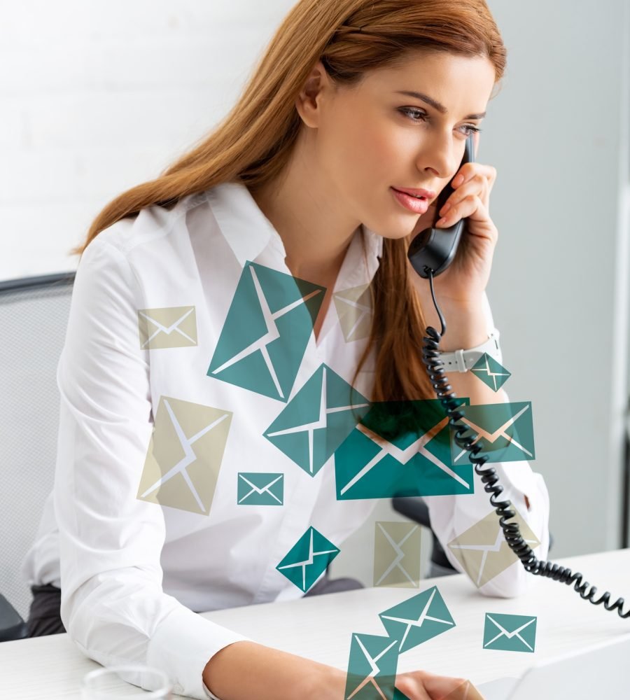 Successful businesswoman using laptop and talking on phone at office table, e-mail illustration